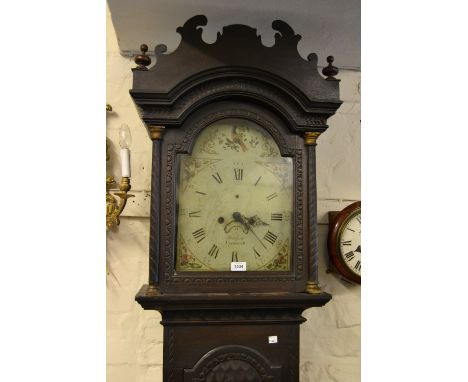 19th Century oak grandfather clock, later carved with Eastern European inscription, the arched hood above an arched door rais