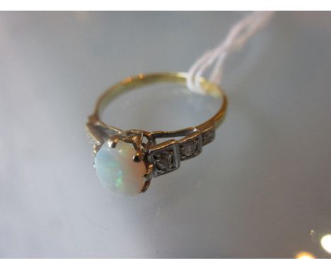 18ct Gold and opal set ring with stepped diamond set shoulders CONDITION REPORT 2.5g