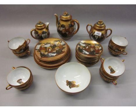 Japanese eggshell tea service decorated with seated figures CONDITION REPORT This is a modern set.Some loss of paint and gilt