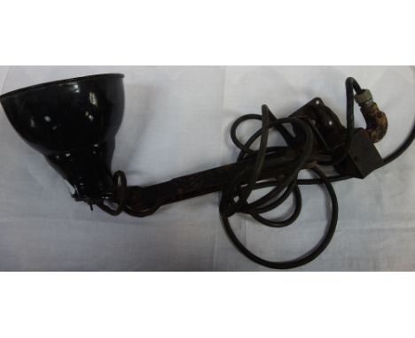 A VINTAGE INDUSTRIAL ANGLEPOISE LAMP with a black enamel shade