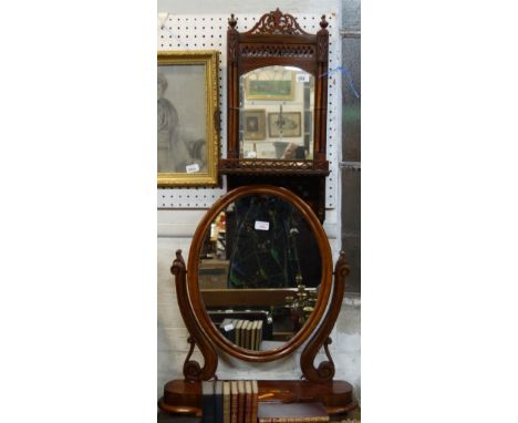 A VICTORIAN MAHOGANY DRESSING MIRROR and a mirrored wall shelf