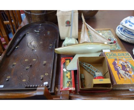 A COLLECTION OF VINTAGE CHILDREN'S TOYS AND GAMES, to include a bagatelle, a tin plate top loading washing machine and a Horn