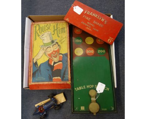 A VINTAGE 'ROUSE HIM' SHOOTING GAME (boxed), a tinplate table hopscotch and a Schuco racing car (examine)