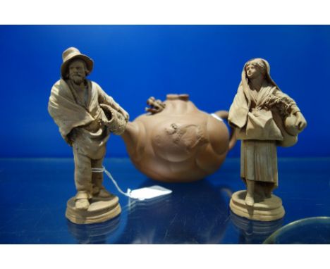 A CHINESE TERRACOTTA TEAPOT, with a loose dragon's head appearing from the lid and a pair of Italian terracotta figures
