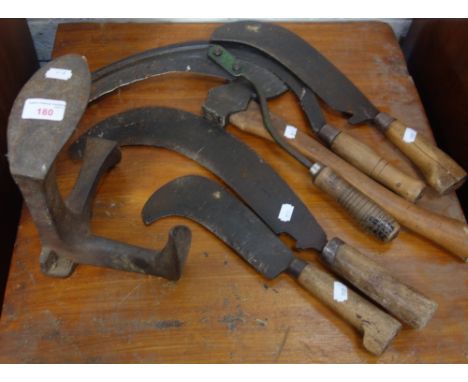 A COLLECTION OF VINTAGE HAND TOOLS to include scythes