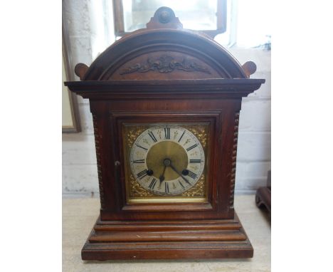 AN EDWARDIAN WALNUT CASED MANTEL CLOCK