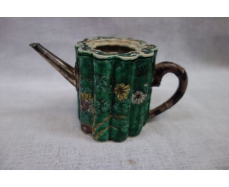 A CHINESE GREEN GLAZED BAMBOO EFFECT TEAPOT with a 'white metal' spout (missing lid)