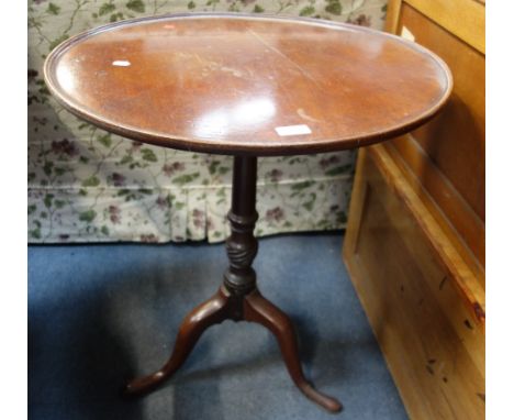 A GEORGE III MAHOGANY TRIPOD TABLE, with dished top, 62cm diameter