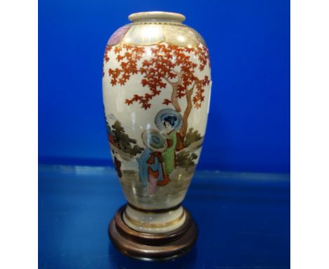 A JAPANESE SATSUMA VASE, MARKED, painted and gilt, 15 cm high, with wooden stand