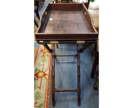 A REPRODUCTION MAHOGANY BUTLER'S TRAY AND STAND, 66cm wide