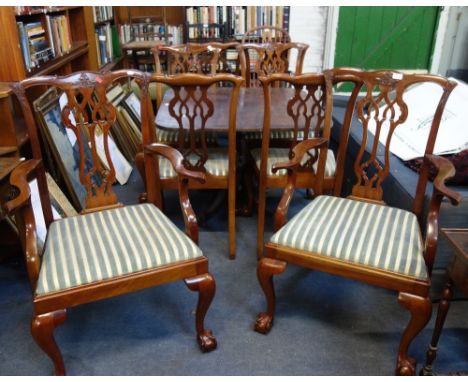 A SET OF EIGHT CHIPPENDALE REVIVAL MAHOGANY DINING CHAIRS, with pierced splats and carved decoration, with drop-in seats on b