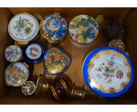A COLLECTION OF CERAMIC PILL BOXES and a perfume bottle