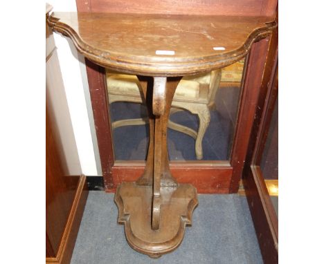 A CONTINENTAL WALNUT CONSOLE TABLE, on scrolling base, possibly Italian c. 18th Century, 70cm wide