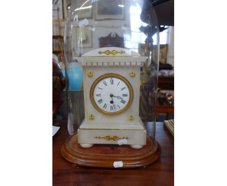 A 19TH CENTURY WHITE ALABASTER CASED MANTEL CLOCK, with gilt metal fittings and white enamel face, on a wooden base under a g