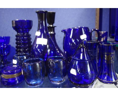 A COLLECTION OF BRISTOL BLUE GLASSWARE, to include a cut glass jug, a decanter and similar