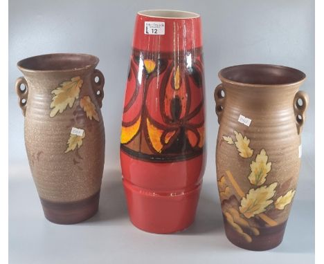 Poole Pottery 85 Delphis Lava ground abstract vase.  42cm high approx. together with a pair of Rouen Art Deco two handled pot