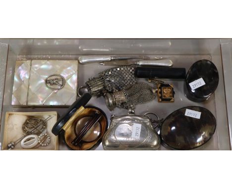 Plastic box containing assorted items to include; white metal ladies purse with ring holder, mother of pearl calling card cas