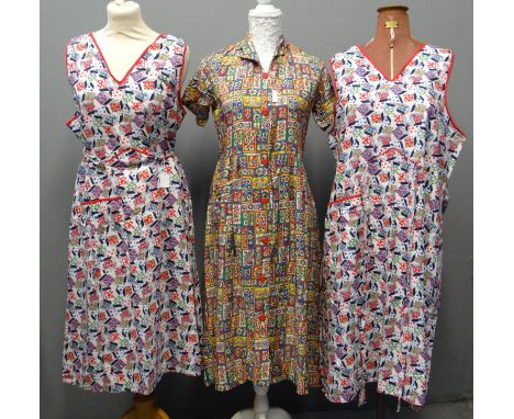 Vintage 1940's/50's multi-colour cotton floral print dress, together with two 1940's printed aprons; one with a utility label