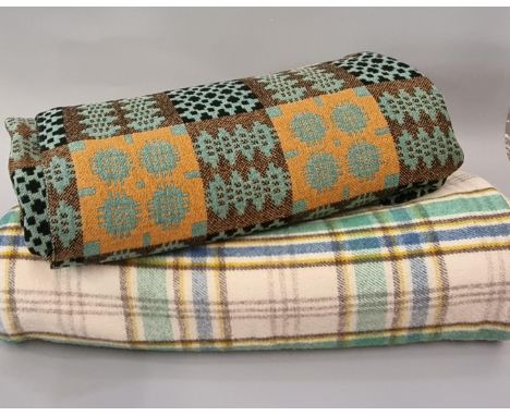 Two vintage woollen blankets or carthen to include; a Welsh tapestry blanket with traditional Caernarfon design and a check b