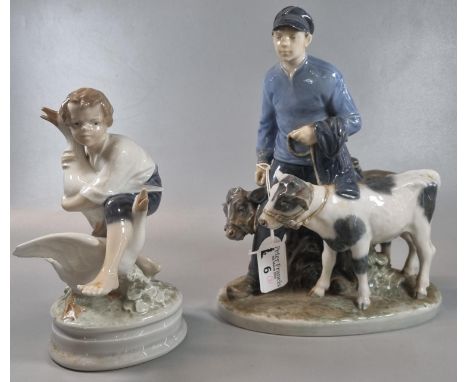 Royal Copenhagen porcelain 1858 model of a boy leading two calves, modelled by Christian Thomsen, together with another royal