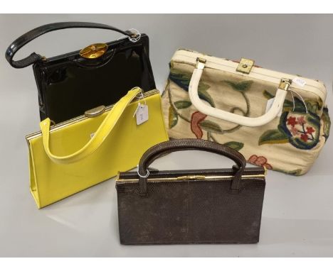 Collection of vintage handbags to include: floral crewel embroidered bag, two patent bags; one black by Lester bags and a yel