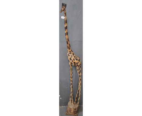 Carved and wooden model of a Giraffe.  170cm high approx.  (B.P. 21% + VAT) 