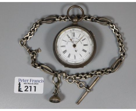 White metal centre seconds chronograph open faced key wind pocket watch, having Roman numerals and sweep seconds hand and wit