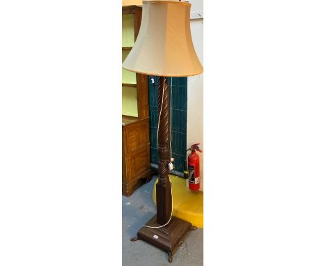 Mahogany moulded standard lamp with shade, on square shaped stepped base.  Originally a bed post.   (B.P. 21% + VAT) 