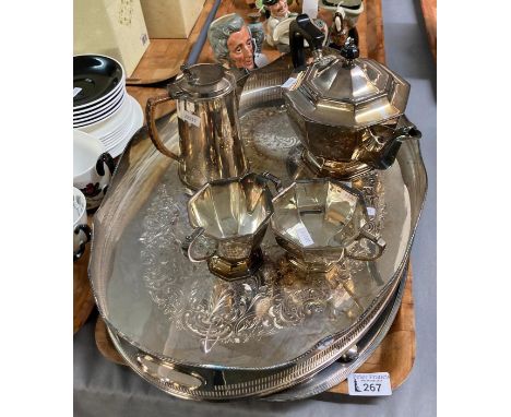 Two silver plated two handled trays together with an Art Deco silver plated three piece tea service and similar water jug wit