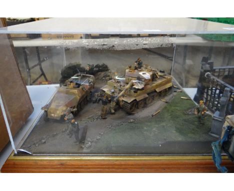 Well made 1:35 scale WWII period military diorama showing various figures together with a German Tiger tank and half track.  