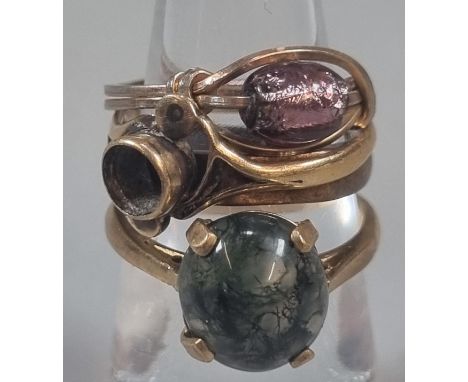 9ct gold dress ring missing its stone.  1.2g approx. together with another 9ct gold and green cabochon stone ring.  3.6g appr