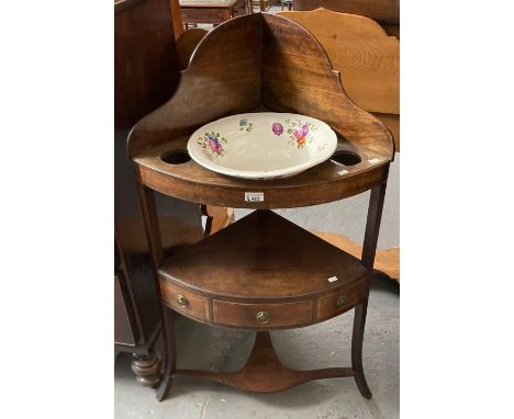 19th century mahogany bow front corner wash stand with ceramic floral bowl.   (B.P. 21% + VAT) 