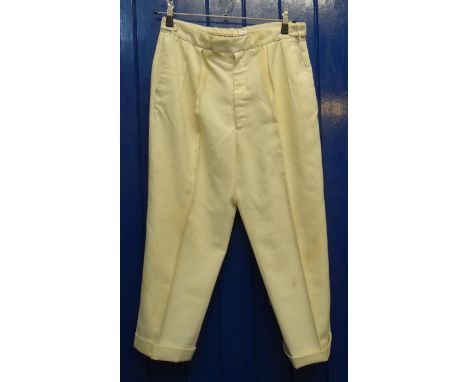 Pair of men's cream vintage cricket trousers marked 'Ken Barrington'. (B.P. 21% + VAT)Some staining and discolouration, no ob