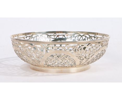 A George V pierced silver bowl, Sheffield 1915, maker William Hutton &amp; Sons Ltd. with pierced scroll border, on a circula