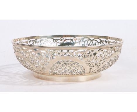 A George V pierced silver bowl, Sheffield 1915, maker William Hutton &amp; Sons Ltd. with pierced scroll border, on a circula