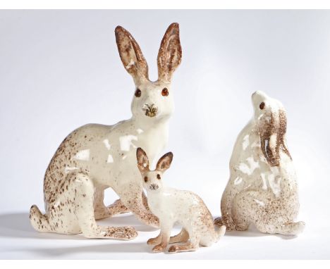 A group of&nbsp; 'Winstanley' pottery Hares, stamped to underside, various sizes (3)