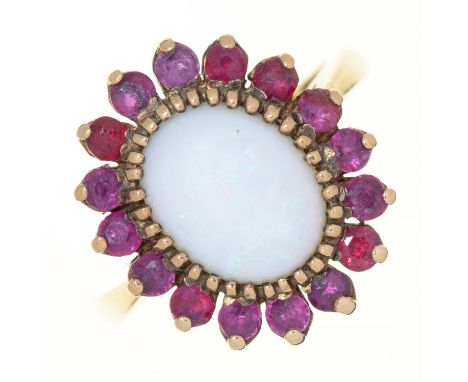 AN OPAL AND RUBY CLUSTER RING IN 9CT GOLD, LONDON 1975, 5G, SIZE L ½ 