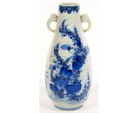 A JAPANESE BLUE AND WHITE VASE WITH ELEPHANT MASK HANDLES, 21.5CM H, C1900 