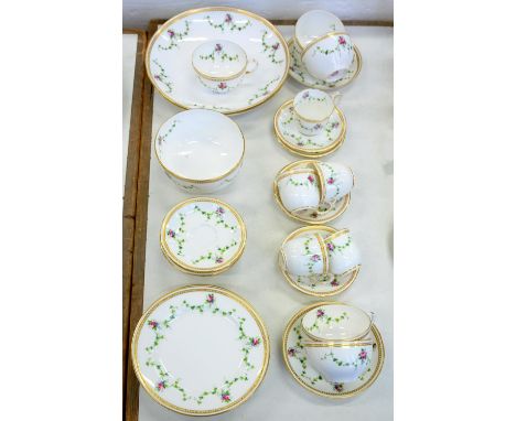 A ROYAL WORCESTER TEA AND COFFEE SERVICE, DECORATED WITH SWAGS BENEATH JEWELLED GILT BORDER, PUCE PRINTED MARK, PATTERN W7783