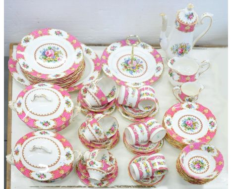A ROYAL ALBERT BONE CHINA LADY CARLYLE PATTERN DINNER SERVICE, PRINTED MARK, INCLUDING ROYAL STAFFORDSHIRE COFFEE CANS AND SA