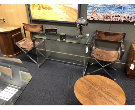 A suite of 1960s-1970s chrome and perspex furniture, with glass tops, to include an octagonal dining table, three leather sea