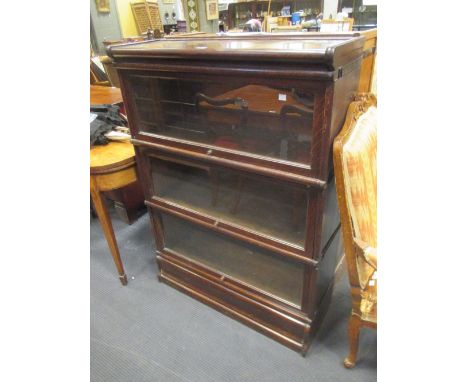 A pair of dark oak Globe Wernicke 3 section stacking bookcases  