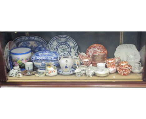 A shelf of mixed china, including a teaset, French pottery, blue and white tureen, etc  