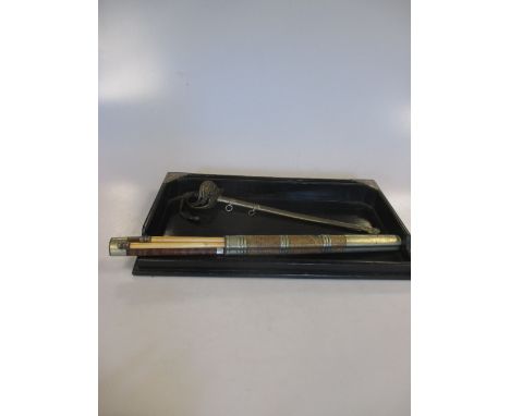 A desk tray together with a novelty paper knife in the shape of a sword and a Japanese travelling set to include chopstick, k