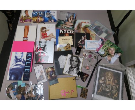 Kylie Minogue lot including UK tour 1991 pink book, Kylie fashion hard back book (2 versions), LA LA LA hardback book, Kylie 