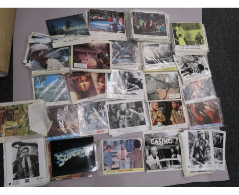 Box of cinema lobby cards and stills measuring 10"x8", most sets include 8 cards, titles inc. Superman The Movie, Abba, Annie