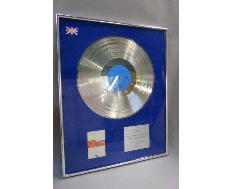 10cc 1977 long playing record album silver disc to recognise the sale in the United Kingdom of more than £100 000 worth, fram