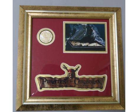 An original pirate treasure coin from the hit film Pirates of the Caribbean - The Curse of the Black Pearl (2003).&nbsp;Simil