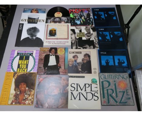 Collection of 80s vinyl records including U2 October, Depeche Mode (sleeve only x3), Simple Minds, Michael Jackson, Jermaine 