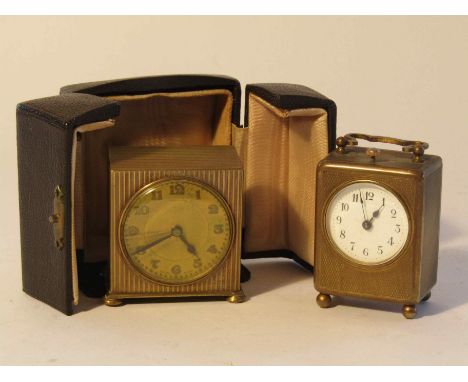 An early 20th Century miniature brass cased clock with repeat mechanism, Arabic enamelled dial (hairlined, 6cm high) together